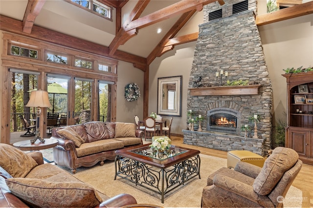 living room featuring a stone fireplace, beamed ceiling, high vaulted ceiling, and wood-type flooring