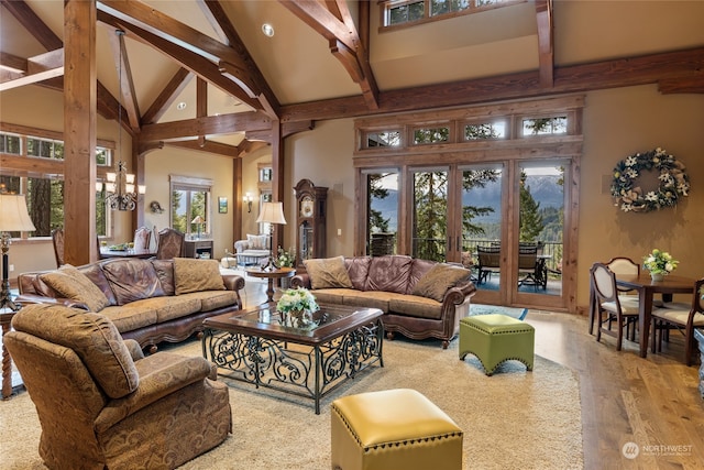 living room featuring beamed ceiling, hardwood / wood-style floors, high vaulted ceiling, and french doors