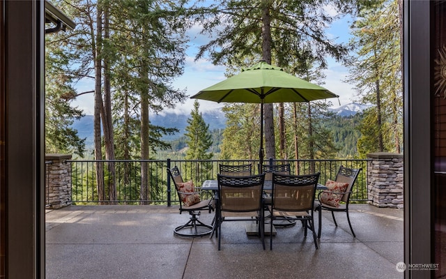 view of patio with a mountain view