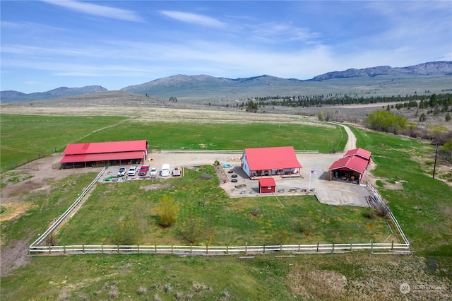 drone / aerial view with a rural view and a mountain view