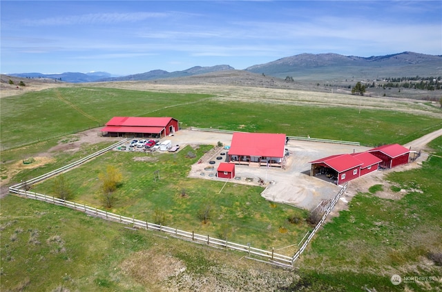 aerial view featuring a mountain view and a rural view