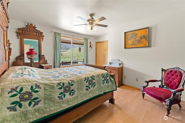 bedroom featuring a closet, ceiling fan, and light wood-type flooring