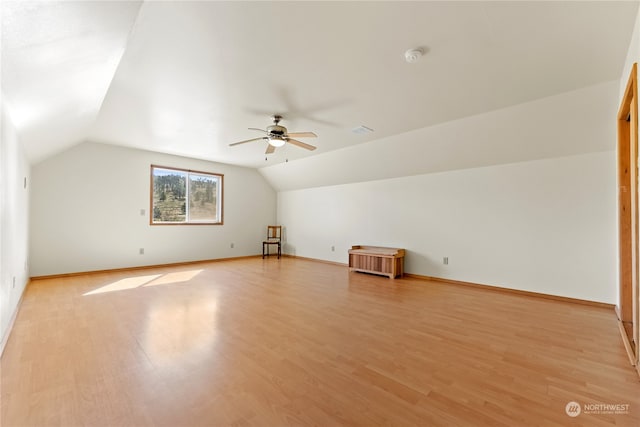 bonus room featuring lofted ceiling, ceiling fan, and light wood-type flooring