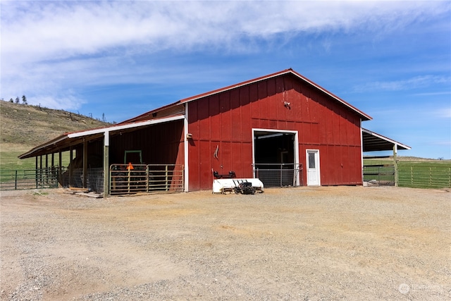 view of stable with an outdoor structure