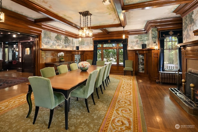 dining space featuring coffered ceiling, a fireplace, hardwood / wood-style flooring, crown molding, and beam ceiling