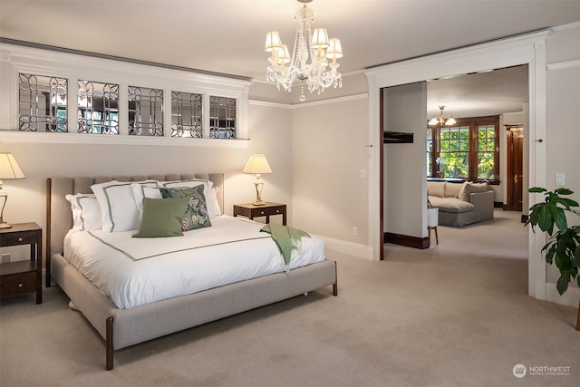 carpeted bedroom featuring ornamental molding and an inviting chandelier