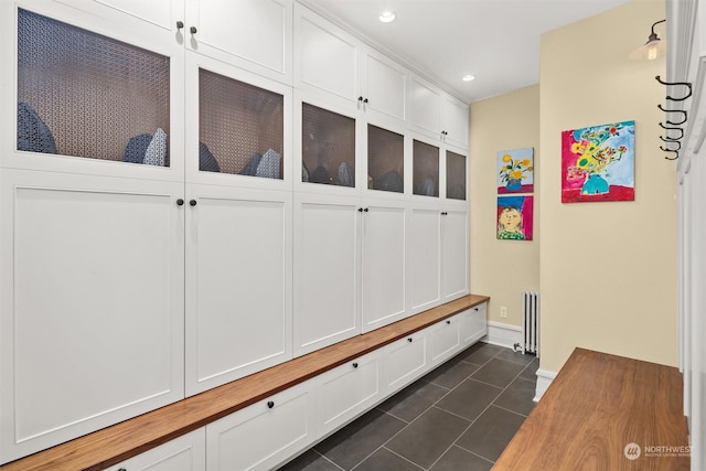 mudroom featuring radiator heating unit