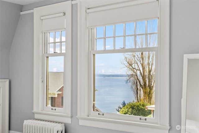 interior details with a water view and radiator heating unit