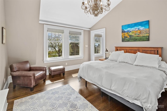 bedroom featuring baseboards, high vaulted ceiling, a chandelier, and wood finished floors