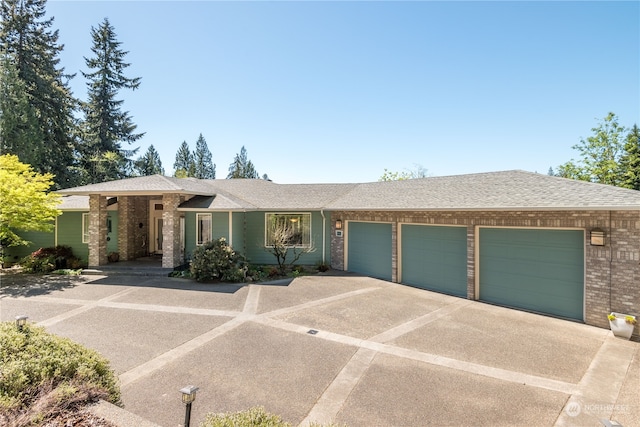 single story home with a garage