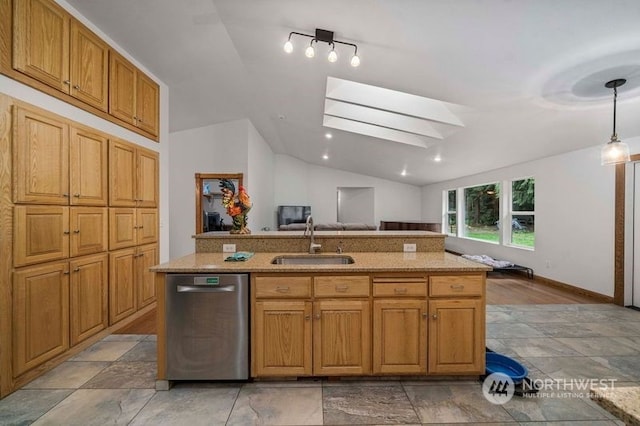 kitchen with decorative light fixtures, lofted ceiling with skylight, stainless steel dishwasher, sink, and light stone counters