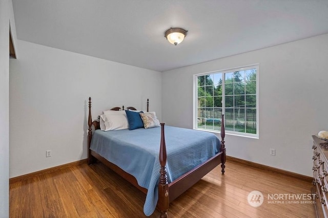 bedroom featuring hardwood / wood-style floors