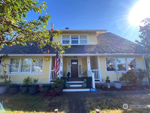 view of front of property featuring covered porch