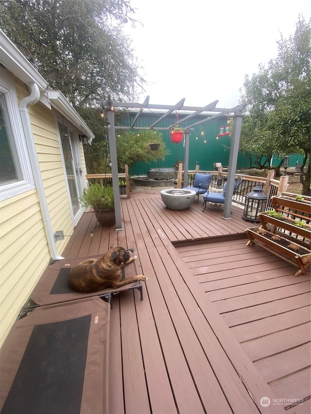 wooden deck with a pergola