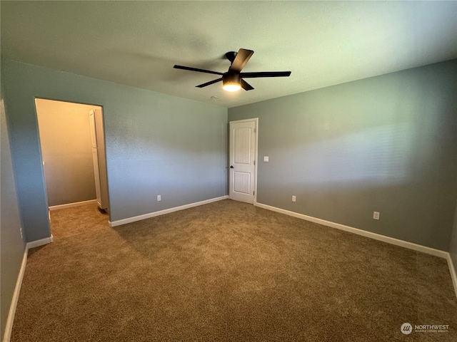 unfurnished bedroom with ceiling fan and carpet floors