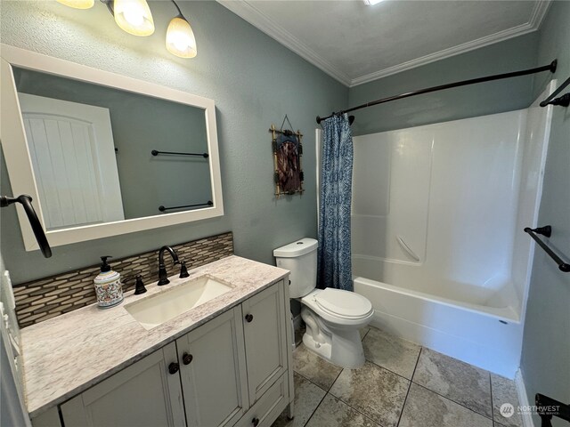 full bathroom with shower / tub combo, toilet, vanity, tile floors, and ornamental molding