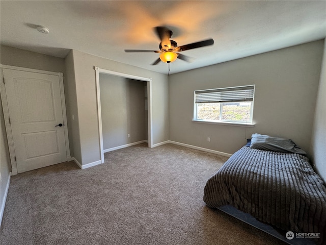 unfurnished bedroom with carpet floors and ceiling fan