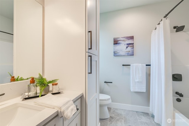 full bathroom with shower / bath combo, vanity, and toilet