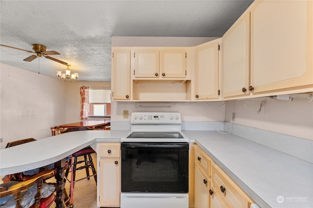 kitchen featuring carpet flooring, cream cabinets, electric range, ceiling fan, and a textured ceiling