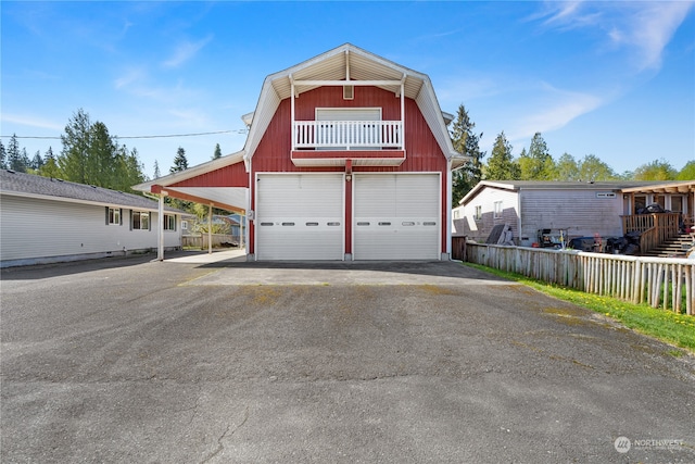 view of front of home with a carport