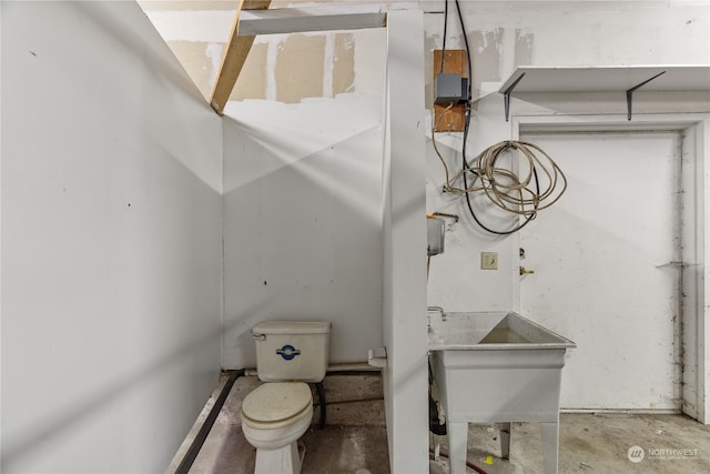 bathroom with sink and toilet