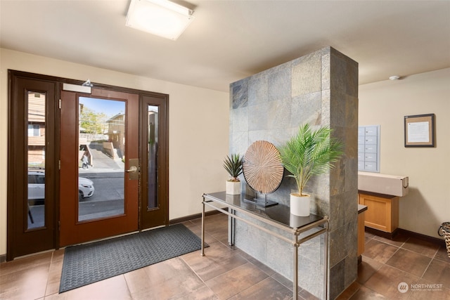 foyer entrance featuring tile flooring