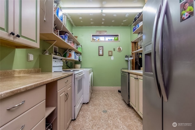 kitchen with appliances with stainless steel finishes and light tile flooring