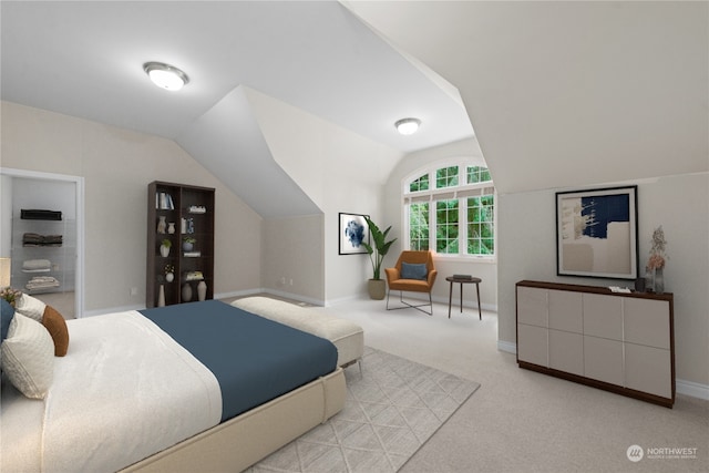 bedroom with vaulted ceiling and light colored carpet