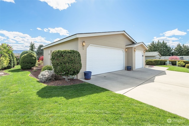 view of property exterior featuring a lawn