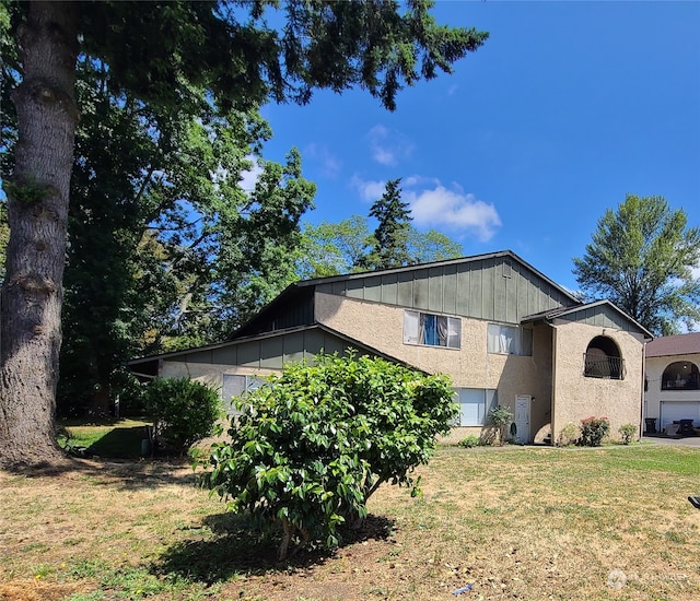 6114 Glen Mary Ln SE Unit A-D, Lacey, WA 98503 - view of property exterior with a yard