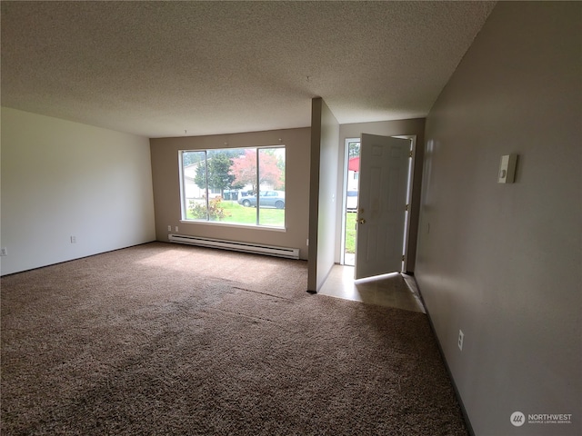 6114 Glen Mary Ln SE Unit A-D, Lacey, WA 98503 - spare room featuring a textured ceiling, carpet, and a baseboard heating unit
