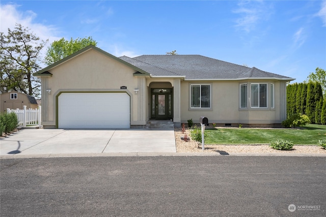 ranch-style house with a front lawn and a garage