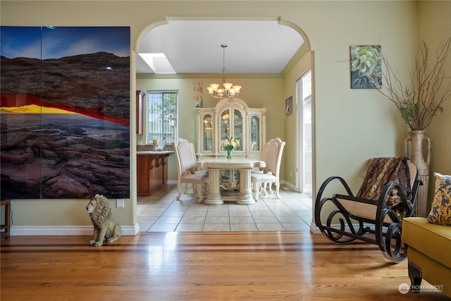 dining room with light hardwood / wood-style floors and plenty of natural light