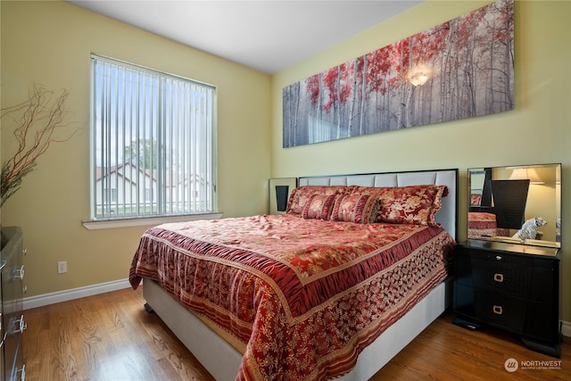 bedroom featuring wood-type flooring