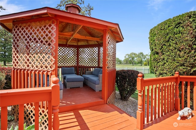 wooden terrace with a gazebo