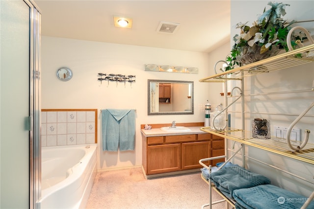 bathroom featuring a tub and oversized vanity