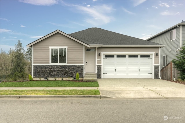 view of front of property featuring a garage