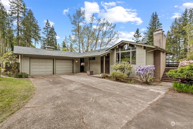 ranch-style home with a garage