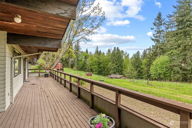 deck featuring a lawn