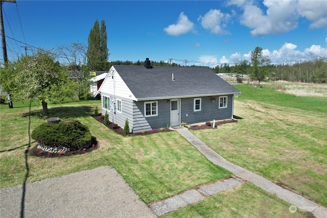 exterior space featuring a front lawn