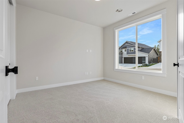 view of carpeted spare room