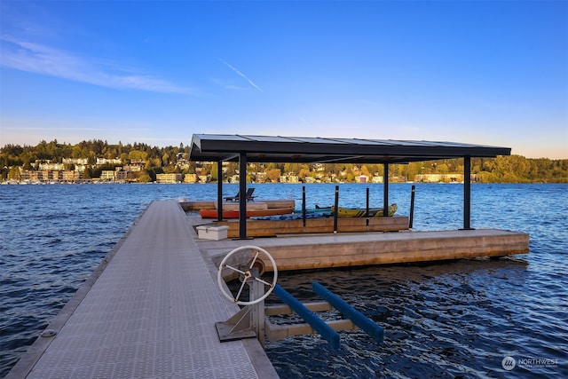 dock area featuring a water view