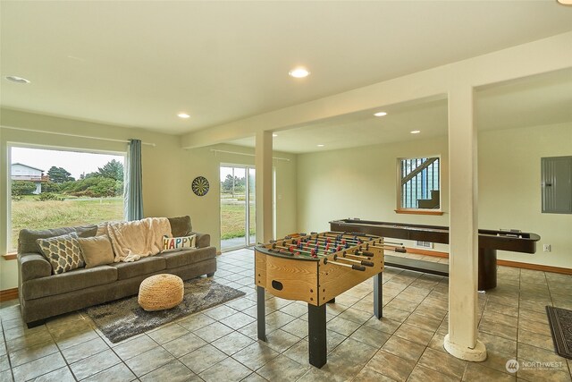 recreation room with tile floors