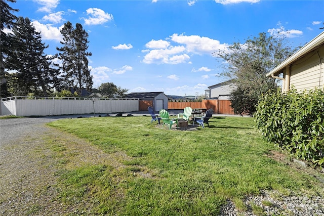 view of yard with a storage shed