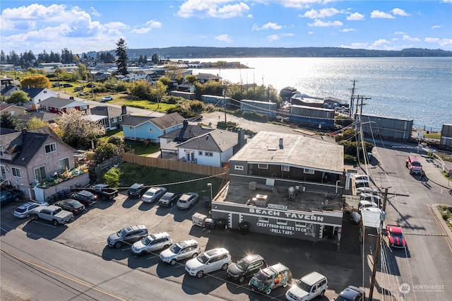 bird's eye view with a water view