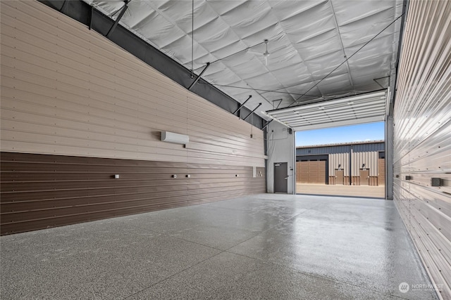 garage featuring an AC wall unit