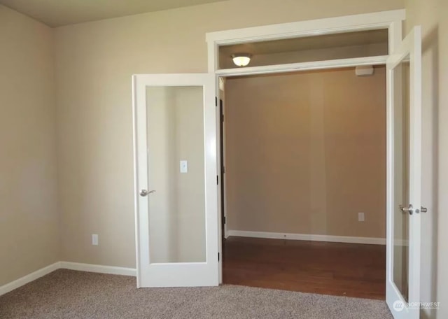 unfurnished bedroom featuring carpet