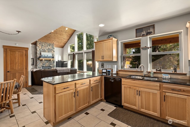 kitchen featuring kitchen peninsula, dishwasher, lofted ceiling, sink, and light tile floors