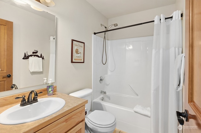 full bathroom with shower / bathtub combination with curtain, toilet, and vanity