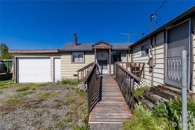 single story home with a garage